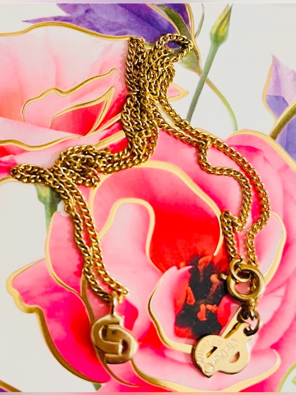 Like New Dior intricately designed gold necklace with renowned logo CD pendants